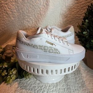 Puma White and Gold Athletic Shoes